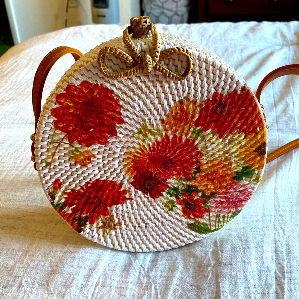 Anthropology Round Hand-woven Rattan crossbody purse.